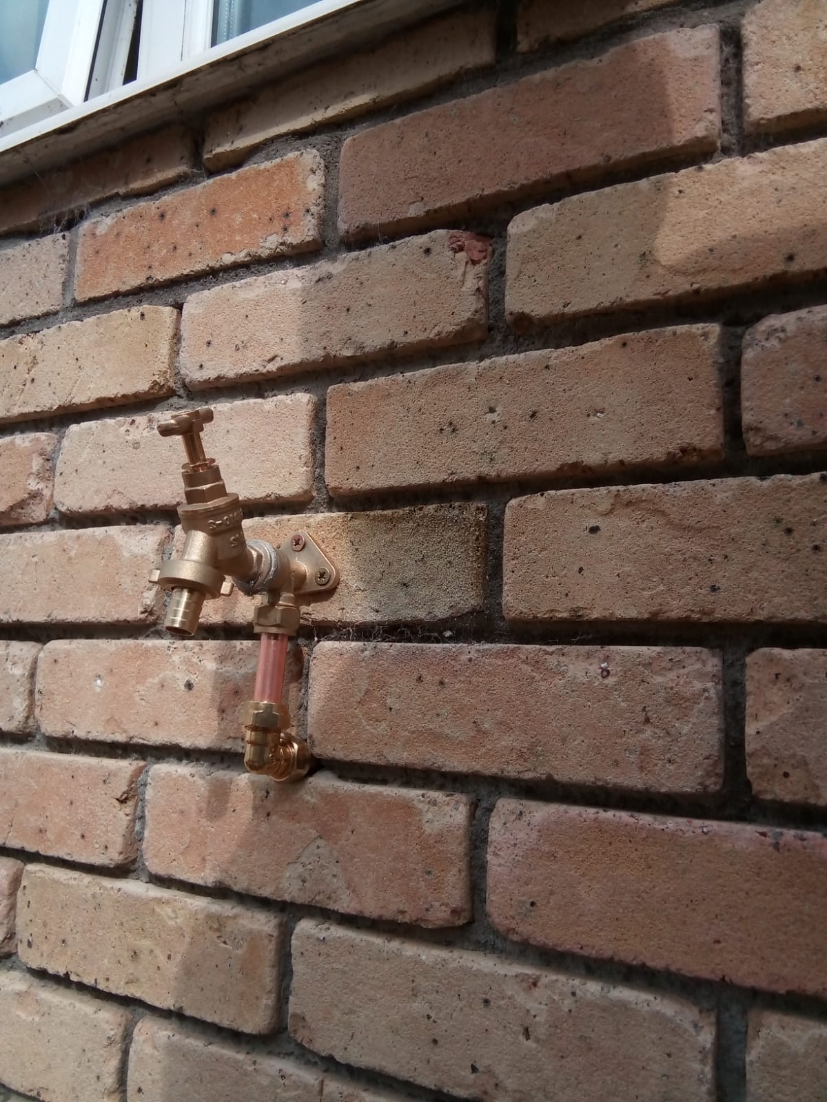 Fitting an outside water tap